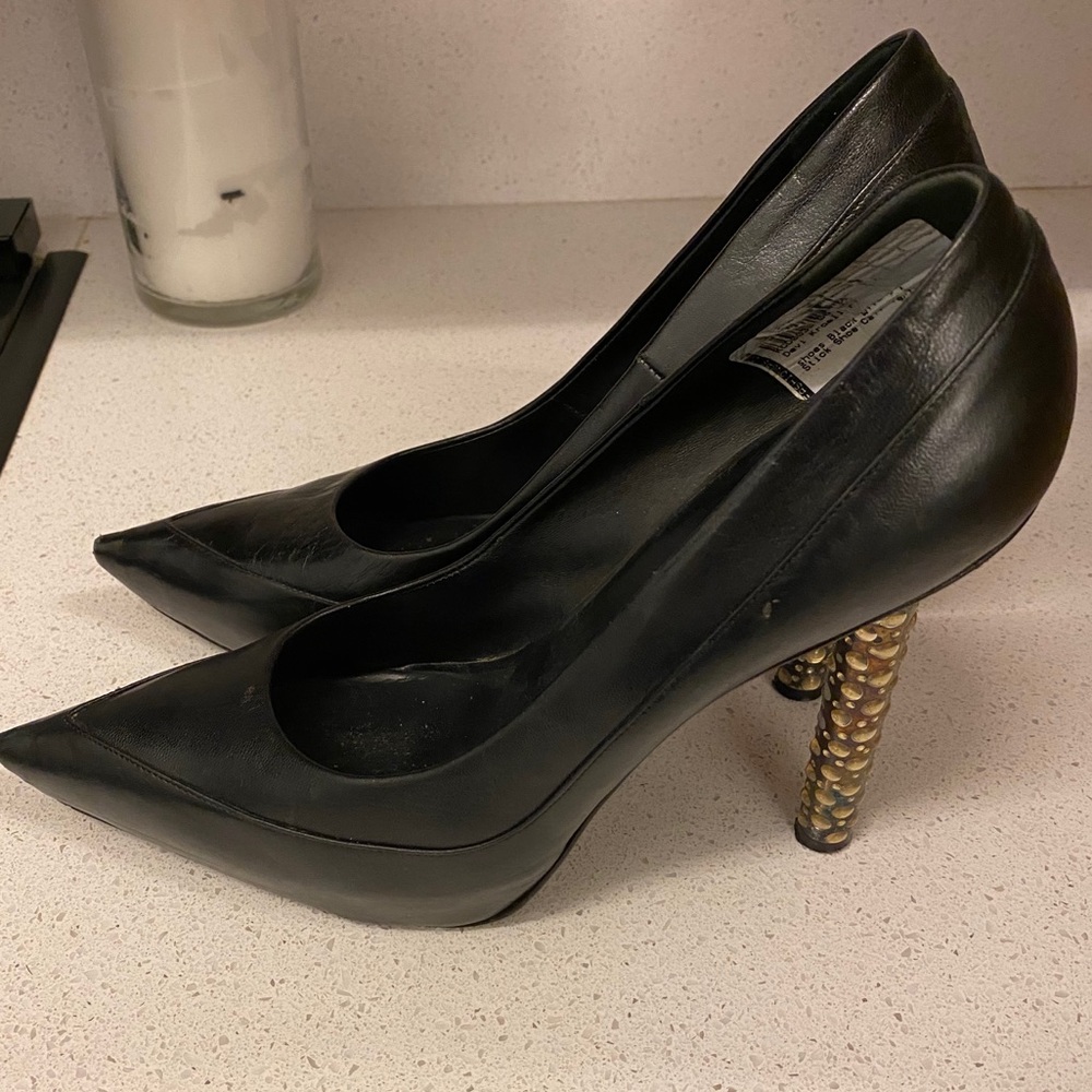 Devi Kroell black leather pumps